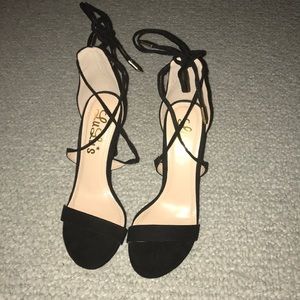 Lulu’s black laced heels